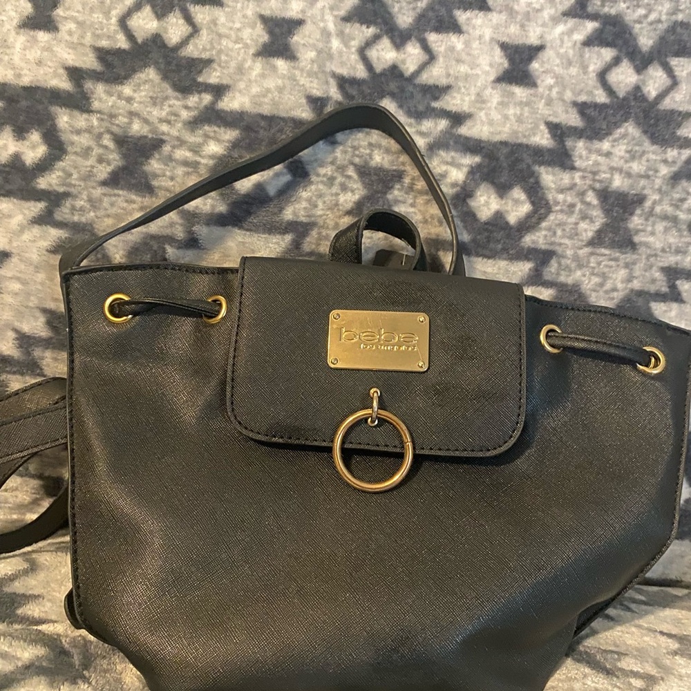 Bebe Black and Gold Backpack with Structured Design
